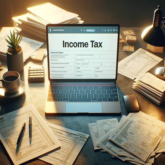 Founder reviewing Income Tax Act 2025 compliance checklist on laptop